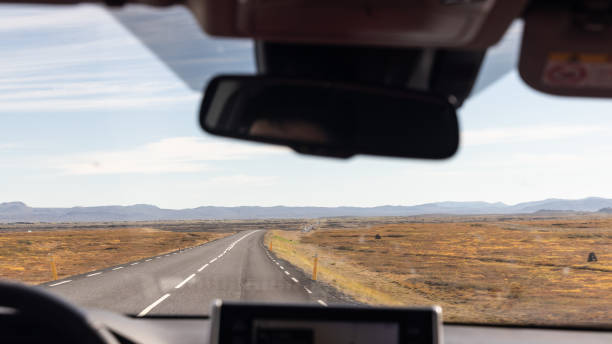 istock Perspective view of Iceland ring road from driver's windscreen inside car 1438387869