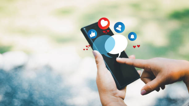 istock Social media technology concept, man hand using smartphone Login to the online network Use social media to do business and marketing payment from home through the Internet. 1438391596