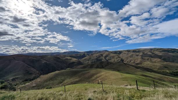 istock Scenic view of mountains on a sunny day 1438391667
