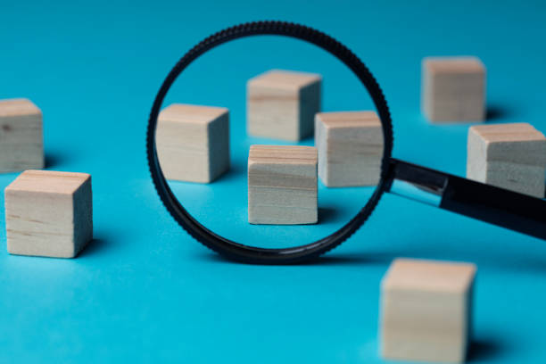 istock Wooden Cubes with Magnifier 1438392116