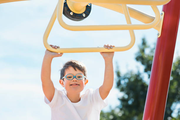 istock child boy having fun on the playground 1438393891