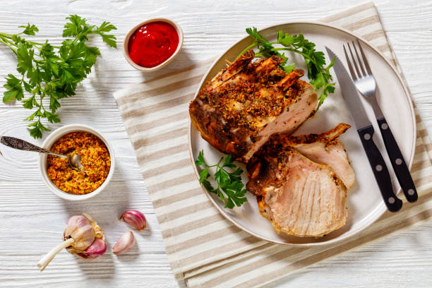 istock Standing Juicy Pork Rib Roast, top view 1438394936