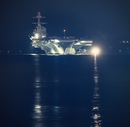 Kanagawa, Japan - May 29, 2022: United States Navy USS Tripoli (LHA-7), America-class amphibious assault ship sailing in Tokyo bay.