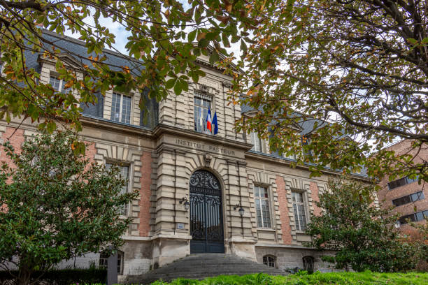 Facade of the historic building of the Institut Pasteur, Paris, France Paris, France - October 30, 2022: Facade of the historic building of the Institut Pasteur, a private French foundation dedicated to the study of biology, microorganisms, diseases and vaccines pasteur institute stock pictures, royalty-free photos & images