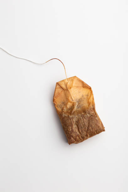 istock used dried up tea bag on a white background 1438399153