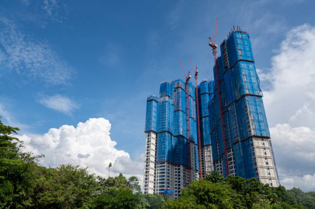 istock Image of modern construction site in city again blue sky. 1438400186