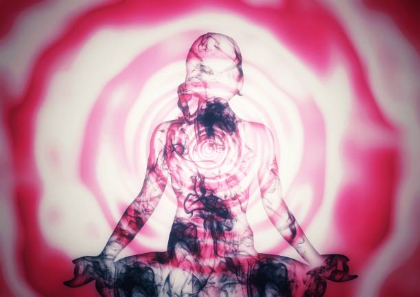 istock 3d illustration of a woman meditating with light effects 1438400841