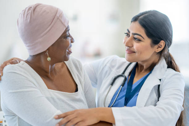 istock Oncologist Hugging a Cancer Patient 1438404042