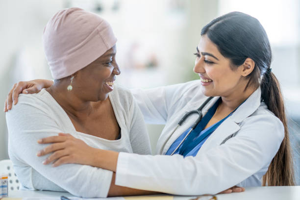 istock Oncologist Hugging a Cancer Patient 1438404062