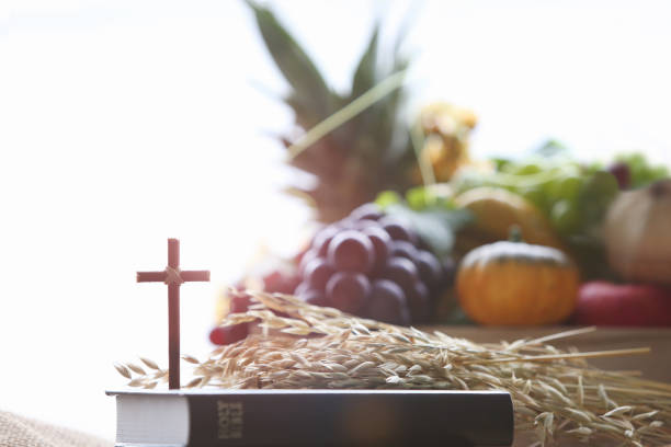 istock Thanksgiving fruit decoration and background with cross and bible 1438405697