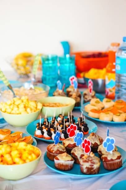istock Decorated party table with different desserts and snacks 1438406154