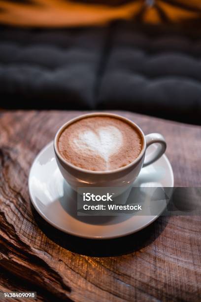 Cup Of Cappuccino With A Heart On It On The Table Stock Photo - Download Image Now - Cappuccino, Breakfast, Brown