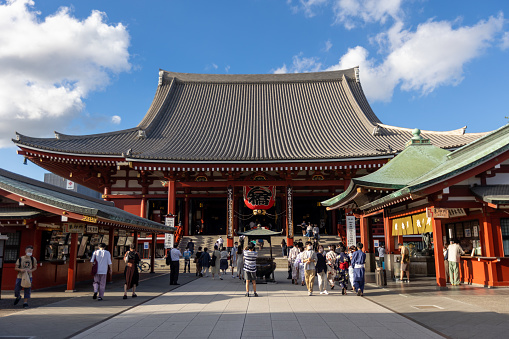 Tokyo, Japan - September 6, 2022 : People at Senso-ji Buddhist Temple in Asakusa, Tokyo, Japan. Senso-ji Temple is symbol of Asakusa and one of the most famous temples in Japan.