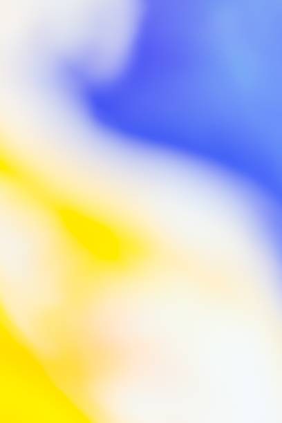 istock Vertical abstract illustration of soft smooth blurred blue, white and yellow background colors 1438413371