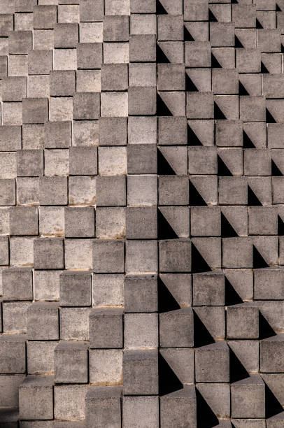 Light playing on a square pattern sculpture