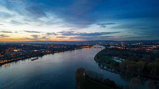Cityscape and river at dusk - aerial view