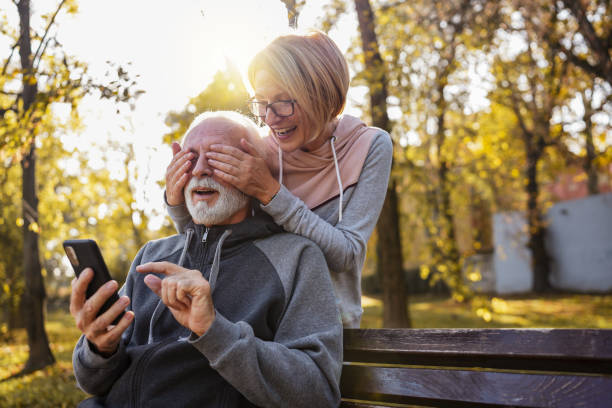 istock An active modern cheerful senior couple meets in the park 1438416292