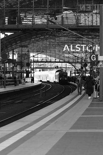 Berlin, Germany – October 28, 2022: A vertical shot of a regional train RE entering Berlin main station in Berlin, Germany