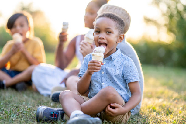 istock Kids eating ice cream 1438417617