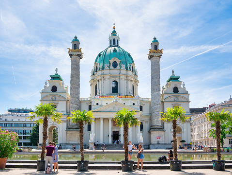 Vienna, Austria - June 2022: View with Karlskirche (St. Charles Church) Habsburg baroque cathedral located on the south side of Karlsplatz in Vienna