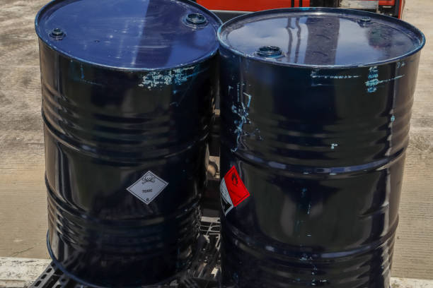 istock Warning symbol for chemical hazard on container 1438419809