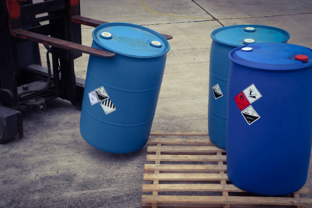 istock Warning symbol for chemical hazard on container 1438419827