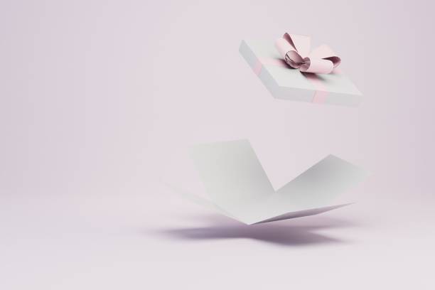 istock the concept of gift wrapping. disassembled gift box with a beautiful bow on a pastel background. 3D render 1438420823