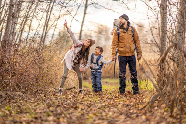istock Looking at Birds on a Family Hike 1438422635