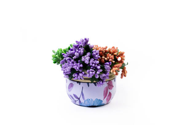 istock metallic vase jar with white red blue flowers . with reflection, white background isolated, 1438422688