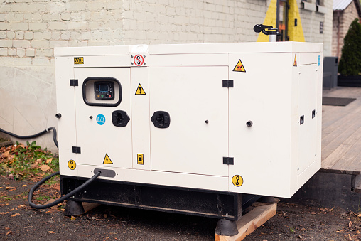 emergency generator for uninterruptible power supply, diesel plant in an iron case with an electrical power management switchboard