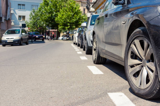 istock Parked cars in a row 1438424455