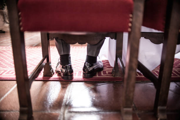 istock in front of the altar 1438428340