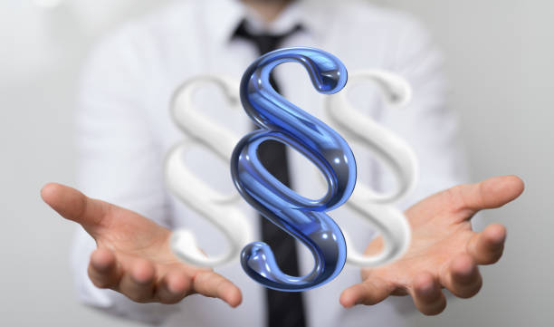 istock Paragraph signs next to each over a person's fingers 1438430385