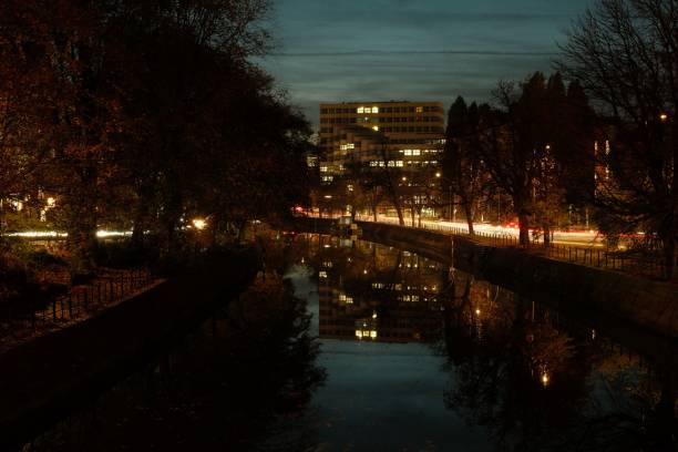 istock Building reflected in the Spree river at night in autumn in Berlin, Germany 1438433410