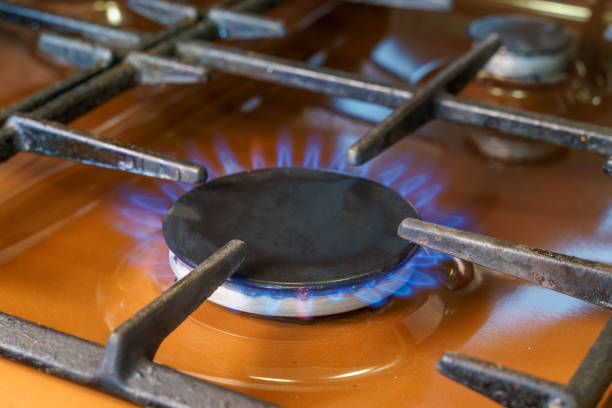 istock A burner on a kitchen gas stove with a blue flame. 1438435158