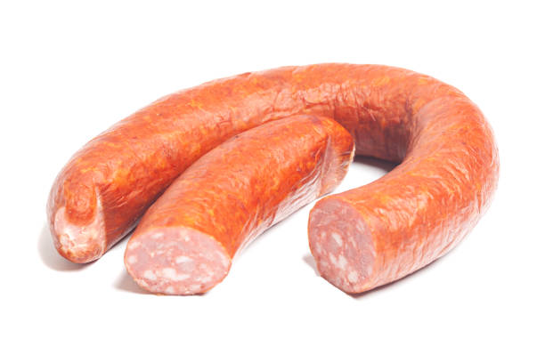 istock Krakow sausage isolated on white background 1438435403