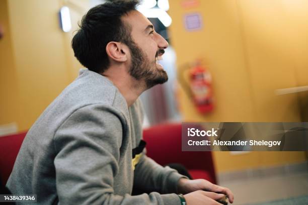 Male Portrait Of Beard Man Who Playing Video Game On Digital Console Indoors People Holding Gamepad In The Hands Xbox And Playstation Concept Photography Stock Photo - Download Image Now