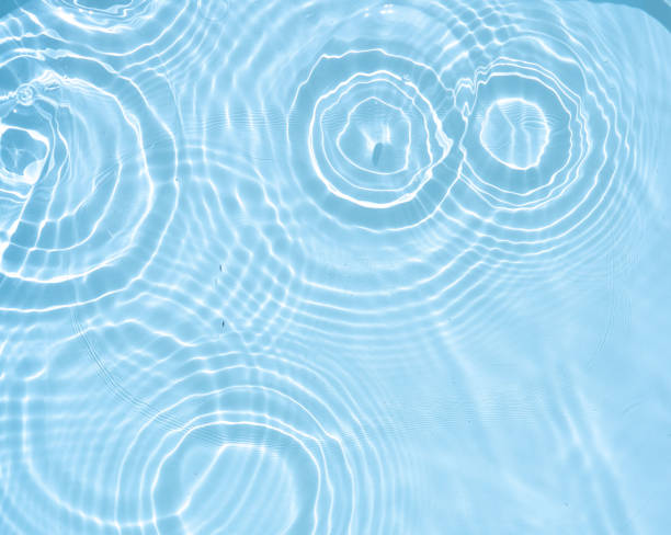 istock The original background image in blue tones with round small waves. 1438440073