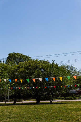 Park with colorful flags on string