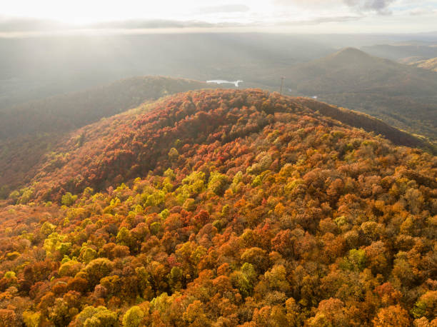 Aerial photo of Georgia Mountains during a beautiful fall sunset with sun rays stock photo