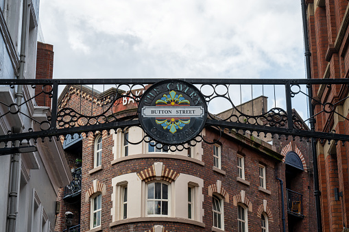 Liverpool, UK- Sept 8, 2022: The sign for Button Street in The Cavern Quarter of Liverpool England.