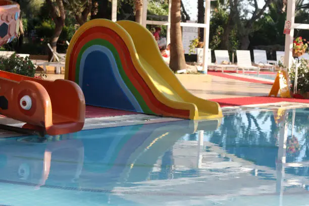 Slide in a pool.