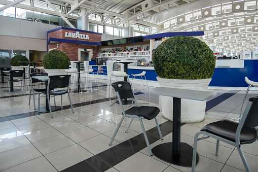 Alajuela, Costa Rica - September 22, 2022: Table area in a cafeteria of the Juan Santamaría International Airport
