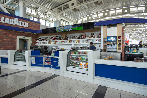 Alajuela, Costa Rica - September 22, 2022: Bar inside the Juan Santamaría International Airport