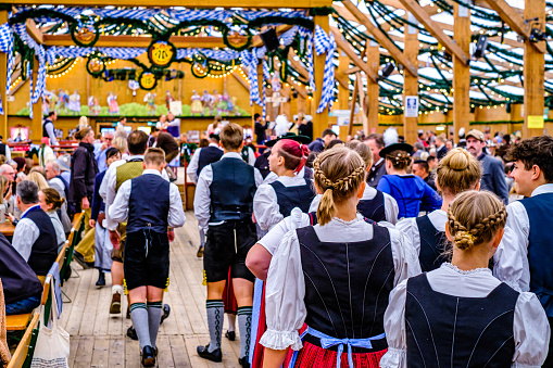Munich, Germany - September 17: bavarian people with tradtional clothes in the Beertent \