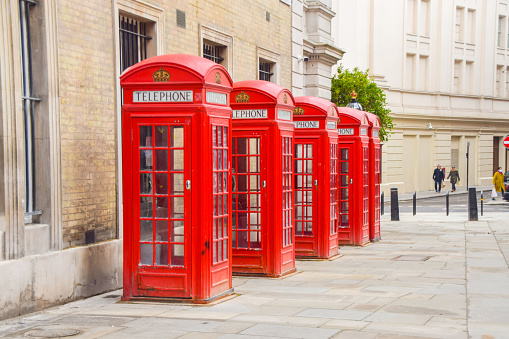London, UK - February 6 2021: Iconic red telephone boxes in Central London