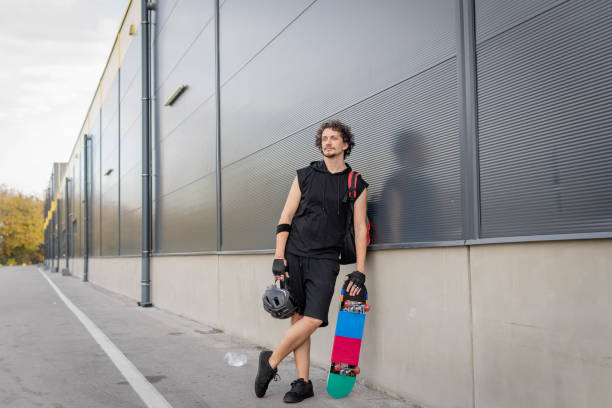 istock Portrait of a man with skateboard 1438452858
