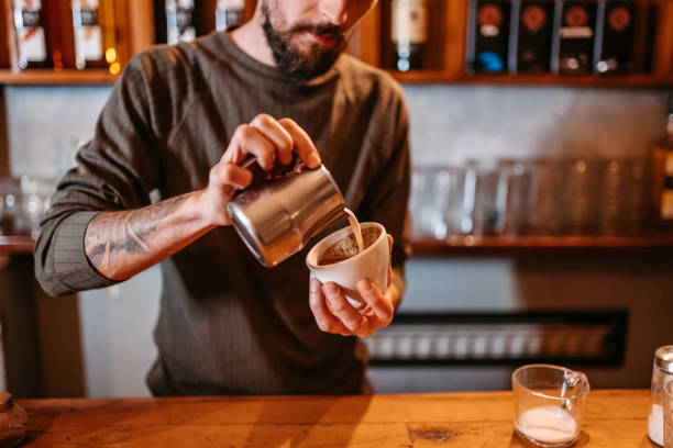istock Barista Making A Cup Of Coffee 1438454375