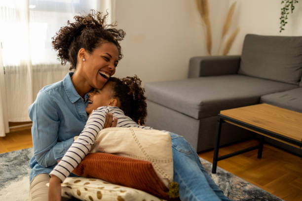 istock Mother hugging her daughter 1438454559