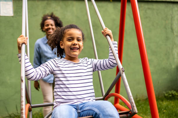 istock Mother and daughter in the park 1438455390